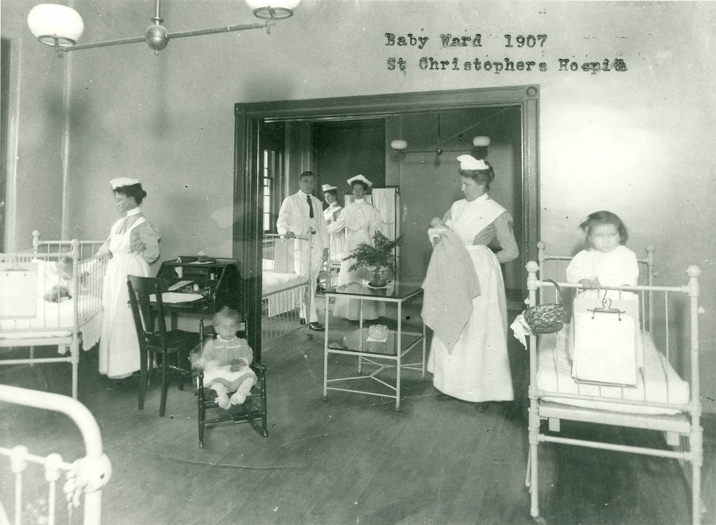Image of nurses and children at baby ward